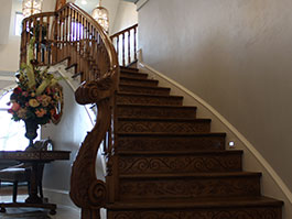 Photograph of curved stairs from bottom