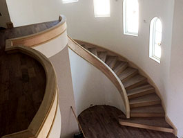 Photograph of curved stair and landing