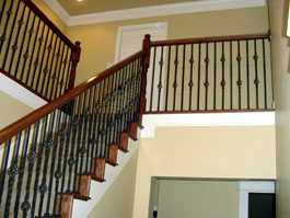 Photograph of circular wood staircase from starter step