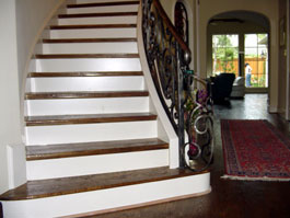 Photograph of circular wood staircase from starter step