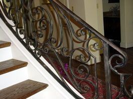Photograph of circular wood staircase from starter step