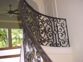 Photograph of circular wood staircase from starter step