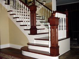 Photograph of circular wood staircase from starter step