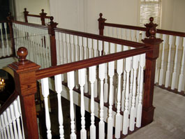 Photograph of circular wood staircase from starter step