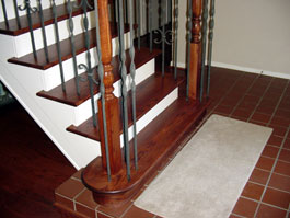 Photograph of circular wood staircase from starter step