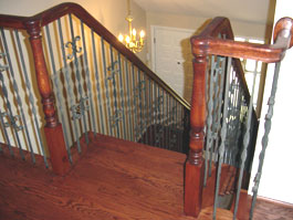 Photograph of circular wood staircase from starter step