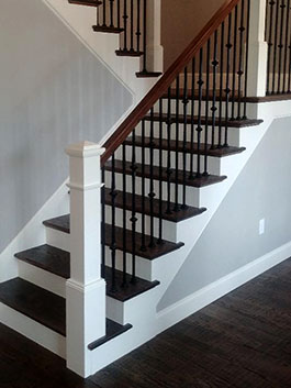 Photograph of circular wood staircase from starter step