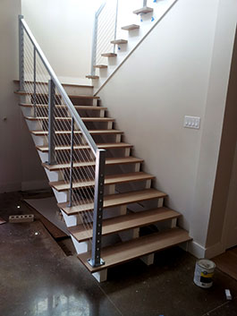 Photograph of straight stair with metal ballusters