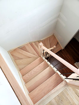 Photograph of straight stair from overhead